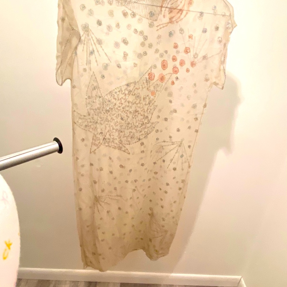 this cover-up it was made in France hand made